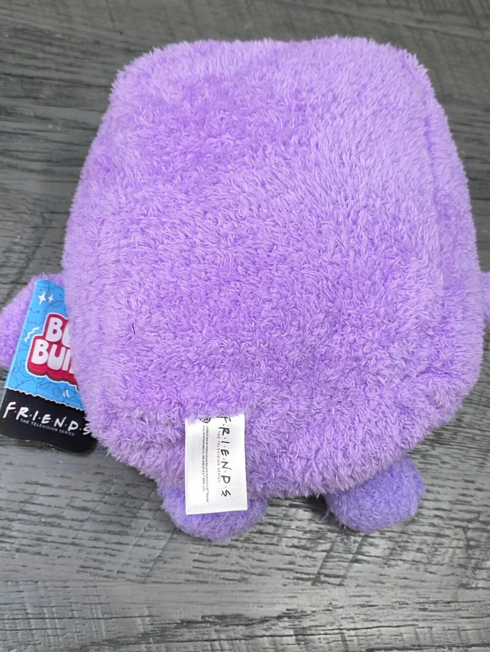 NWT FRIENDS Purple Plush Frame Character with Yellow Trim